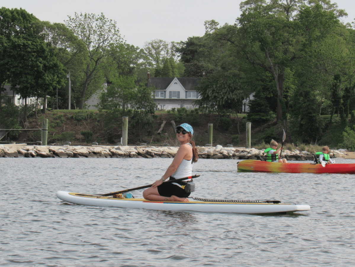 a man rowing a boat in the water